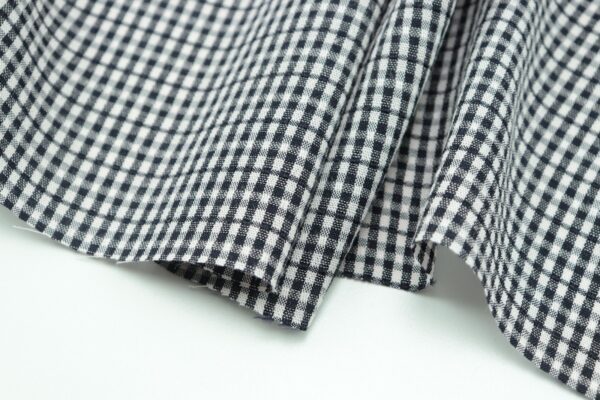 black and white plaid textile