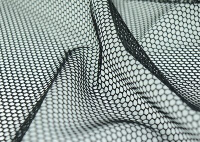 a black and white photo of a mesh fabric