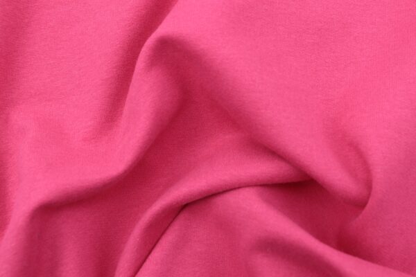pink textile in close up image