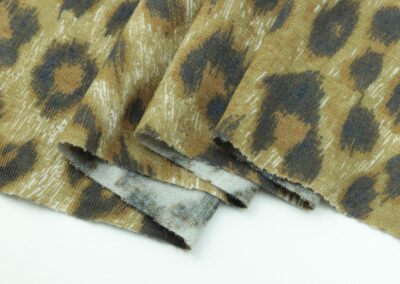 brown and beige textile on white surface